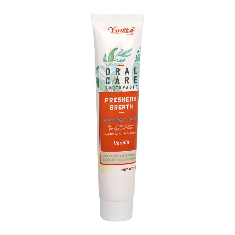 Vanilla dog toothpaste tube with green and orange accents, labeled 'Oral Care' and 'Freshens Breath