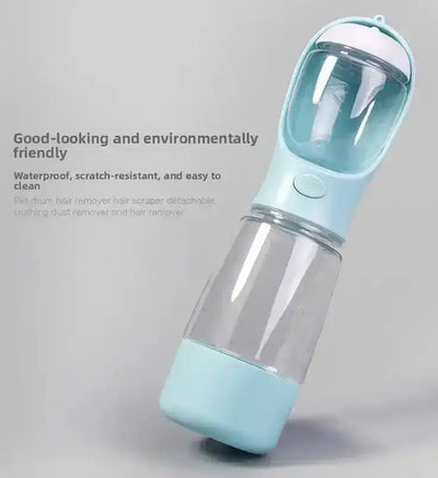 Light blue pet hair remover with clear chamber and rounded top on gray background | PicSEO 1786063213753