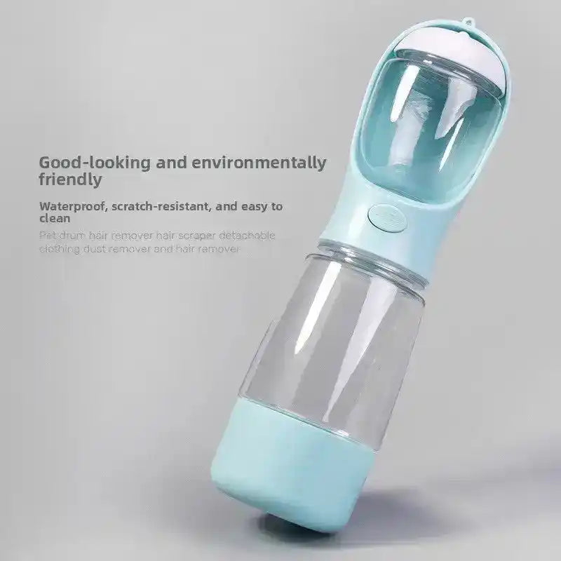 Light blue pet hair remover with clear chamber and rounded top on gray background | PicSEO 1786063213753