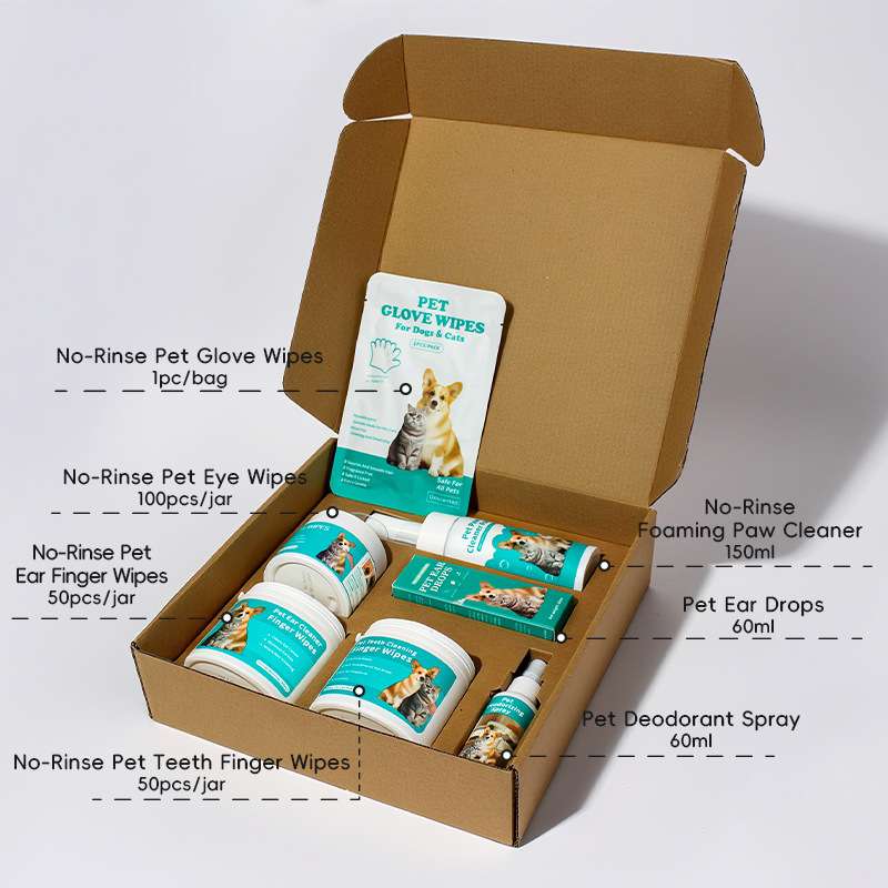 Gift box containing various pet grooming wipes and cleaners, including eye, ear, and teeth wipes, and deodorant spray.