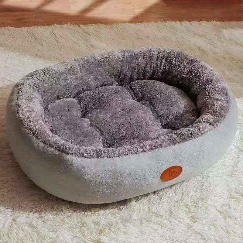 Oval Plush Dog Bed With Fleece Lining & Waterproof Base - Dog Beds & Furniture - TinPaw