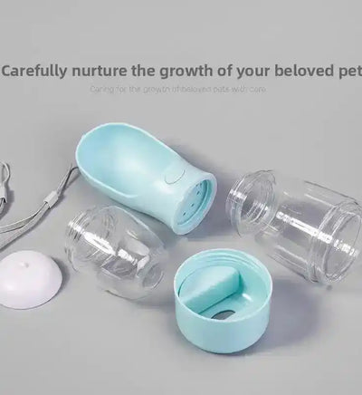 Light blue pet feeder parts with clear plastic containers, white cap, and gray lanyard on gray background | PicSEO 1786063220224