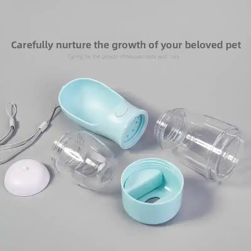 Light blue pet feeder parts with clear plastic containers, white cap, and gray lanyard on gray background | PicSEO 1786063220224